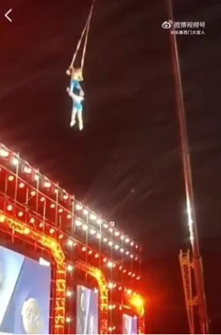 Chinese acrobat falls to her death after display goes wrong as her husband loses grip on her during performance