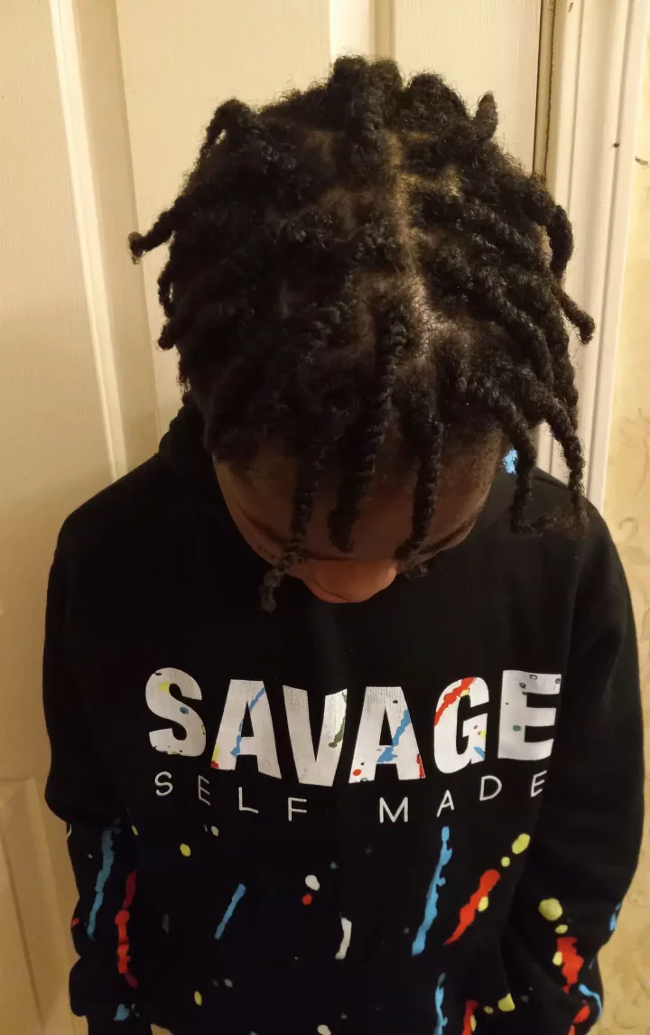 Lady calls out baby daddy for spitefully cutting son's dreads