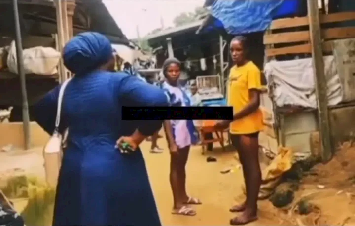 Drama as female preacher aggressively confronts young girls in market over indecent dressing (Video)