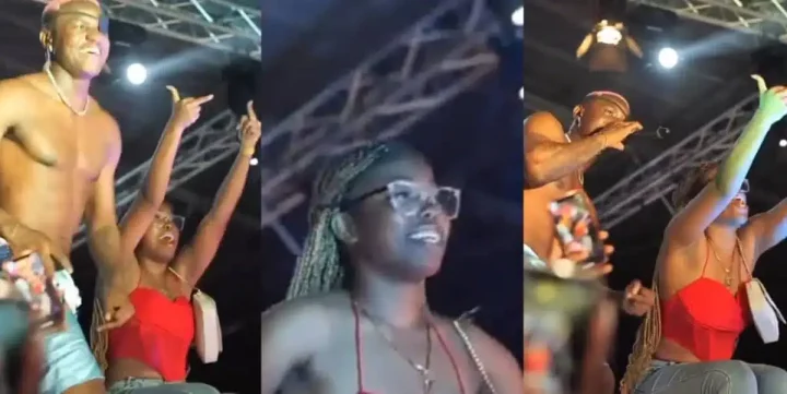 Moment Ruger invites female fan on stage, orders her to cuss out her boyfriend (video)