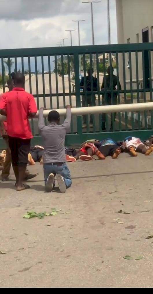 Plateau Attack: Two mobile policemen unable to hold back tears as bodies of victims are displayed at Government House (photos)
