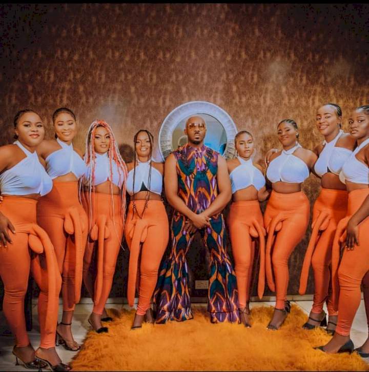 Pretty Mike shows up at Don Jazzy's mother's funeral with women wearing big p*nis trousers