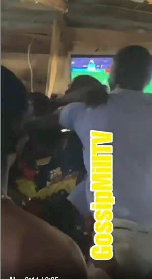 Moment angry Manchester United fan goes physical on Liverpool fan at a viewing centre (Video)