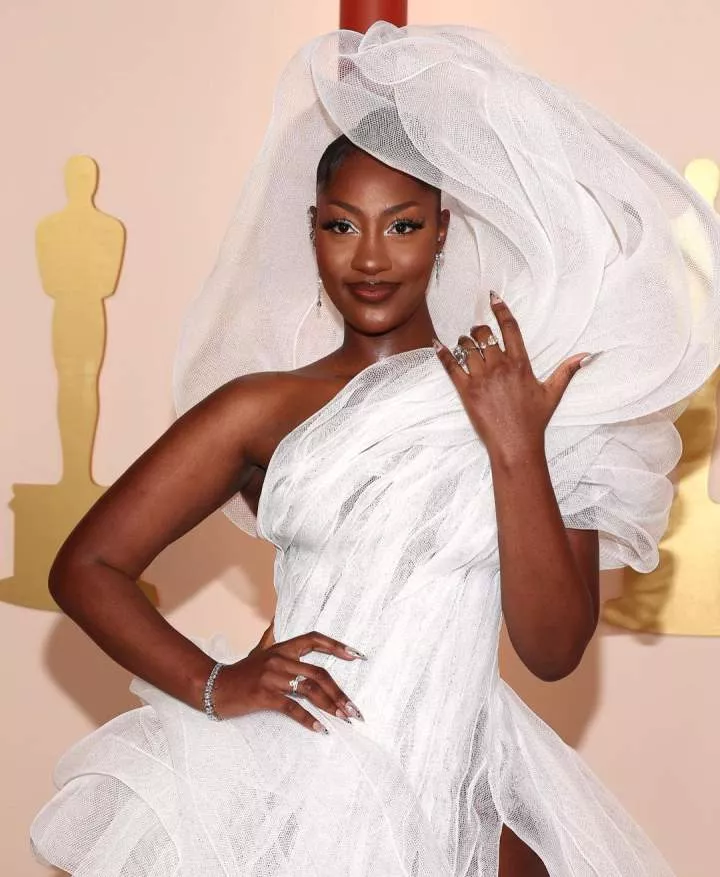 Netizens drag Tems over 'view blocking' outfit to 2023 Oscars Award