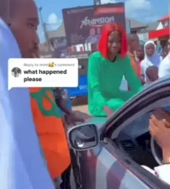 Lady makes a scene to prevent husband from zooming off with their kids after dumping her (Video)