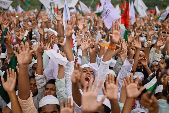 Thousands of activists of Islamist group Hefazat-e-Islam denounce proposed recommendations for equal rights for Muslim women, at a protest rally in Dhaka, Bangladesh, Saturday, May 3, 2025. (AP Photo/Mahmud Hossain Opu)