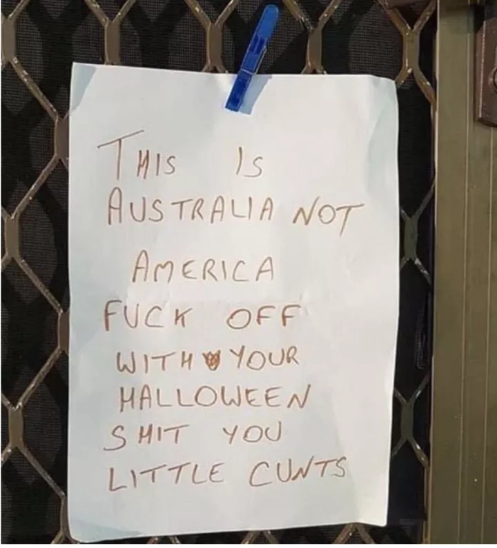 A note taped to a front door reads &quot;this is Australia not America, fuck off with your Halloween shit you little cunts&quot;