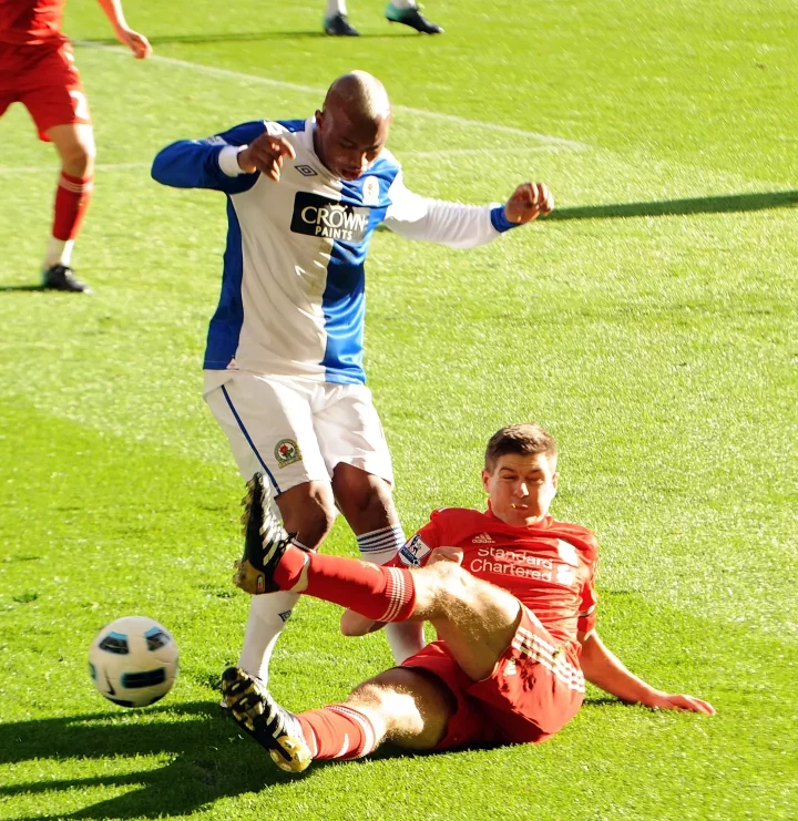 Steven Gerrard and El Hadji Diouf battling in 2010 during Blackburn Rovers vs Liverpool- Getty