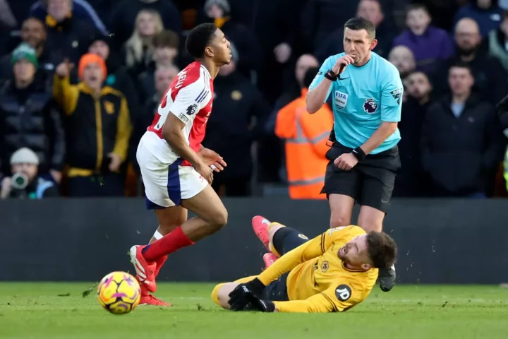 Michael Oliver recently sent off Arsenal's Myles Lewis-Skelly was sent off for a challenge on Matt Doherty. (Image:Getty)