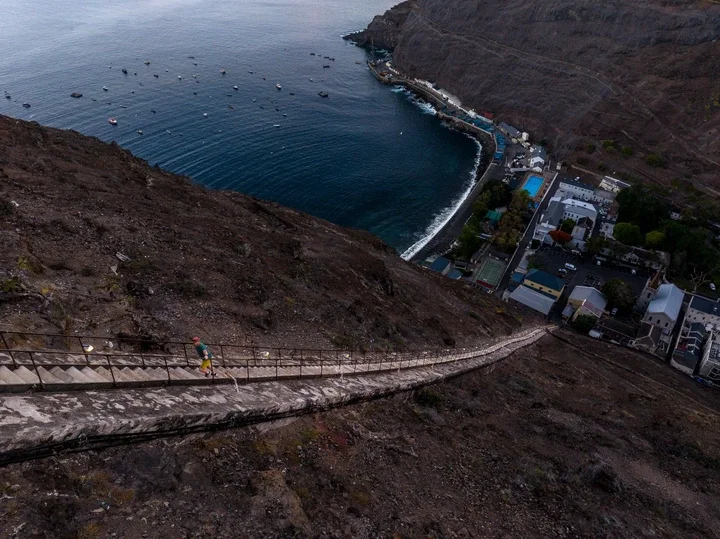 Image may contain Nature Outdoors Sea Water Person Shoreline Coast Road and Aerial View