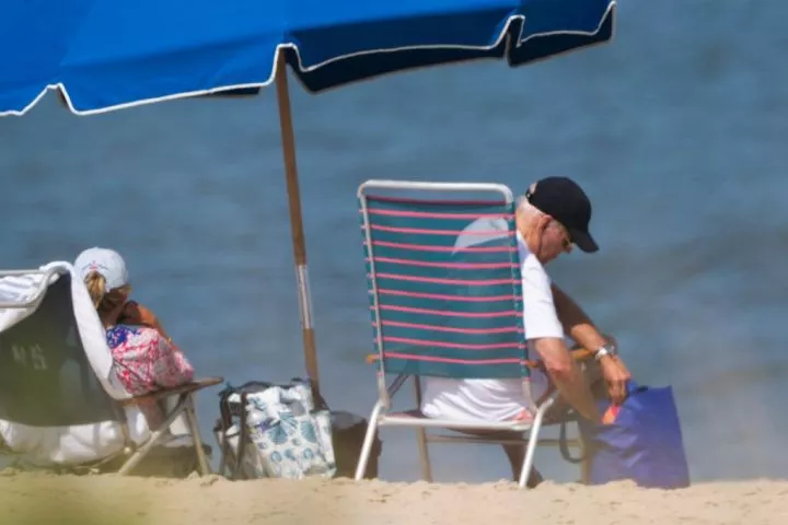 US president Joe Biden chills on beach for second straight week after vowing to 