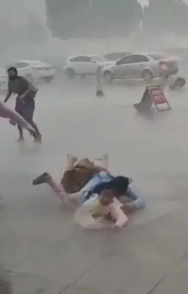 Shocking moment wind sweeps off mother and daughter