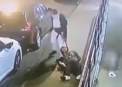 Masked man chokes woman on street and drags her unconscious body between cars to r@pe her (video)