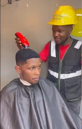 Barber uses pencil to solve maths on customer's head to give him a top-notch cut