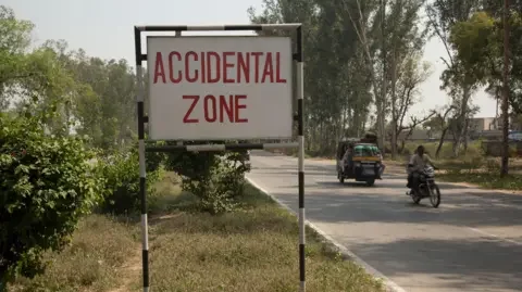 Getty Images A sign on the highway that connects New Dehli to Mathura, India.