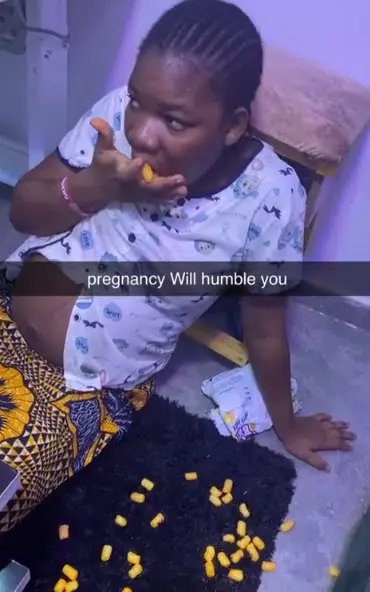 'Pregnancy will humble you' - Pregnant Nigerian woman causes buzz as she eats cheese balls from floor like baby