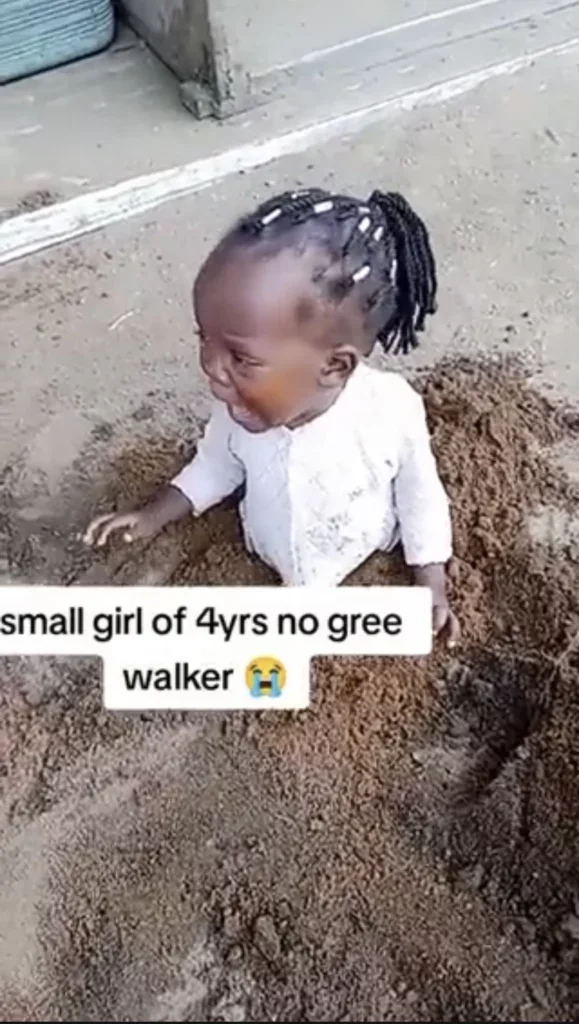 Video of little girl half buried in sand causes stir on the internet