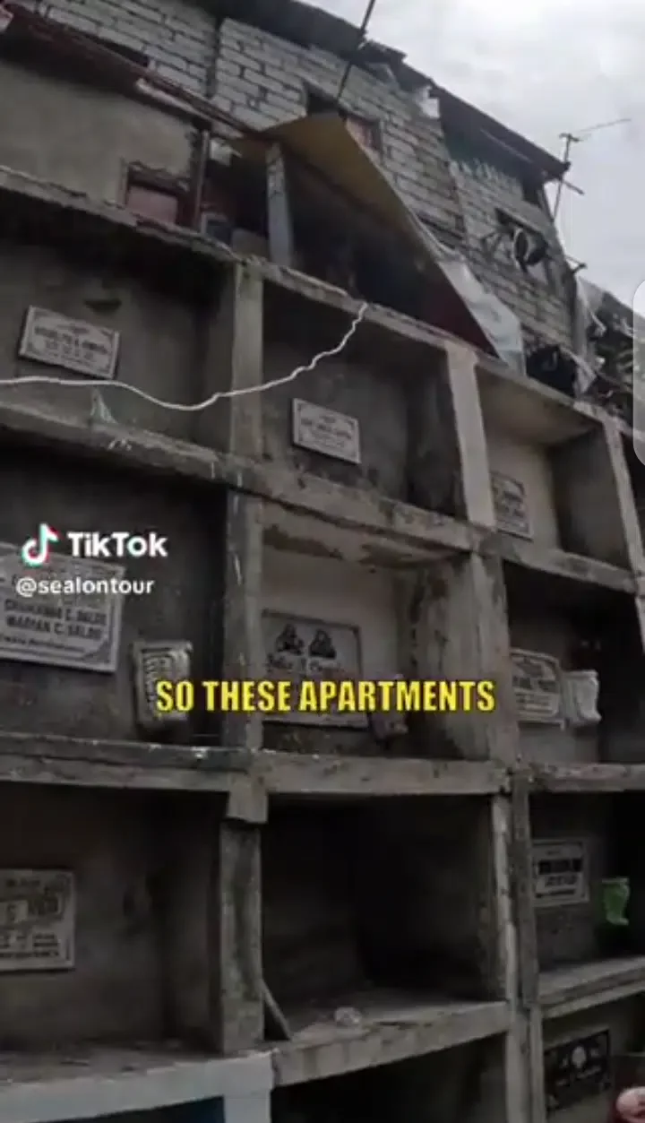 Mixed reaction as family builds house on top of a cemetery in the Philippines (Video)