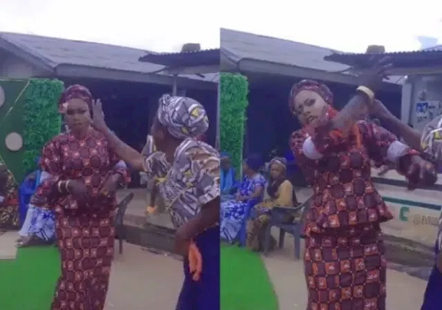 Bride blows hot at guest who used money to wipe her face, rejects the money (Video)