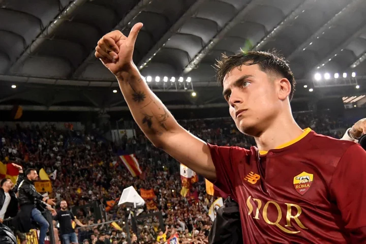 Roma star Paulo Dybala greets the crowd