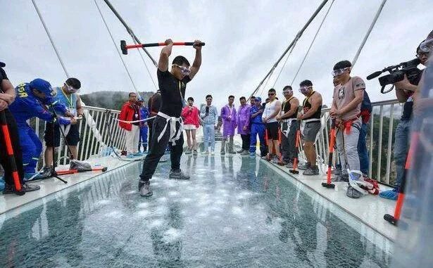 See How The Chinese Glass Bridge Was Tested Before People Were Allowed To Cross (Photos)