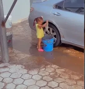 'Pay her well' - Netizens react as 2-year-old girl washes mum's car alone in viral video