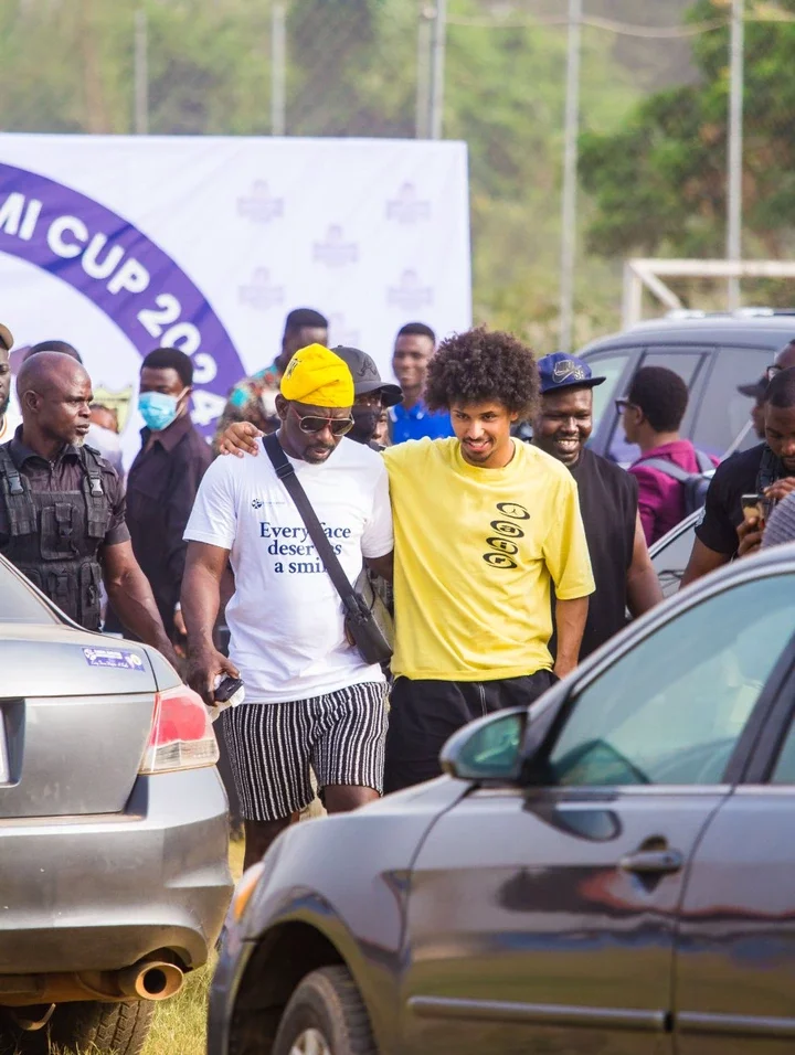 Fans react after spotting German attacker, Karim Adeyemi and his father in a stadium in Ibadan.