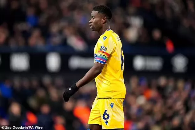 Update:  Defiant Crystal Palace captain, Marc Guehi ignores FA warning, writes ?Jesus loves you? on new LGBT rainbow armband (Photos)