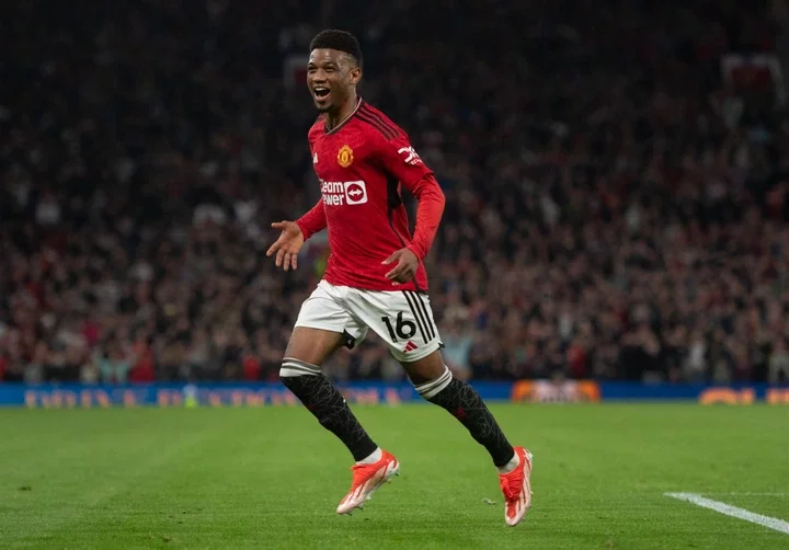 Amad Diallo of Manchester United celebrates scoring his team's second goal during the Premier League match between Manchester United and Newcastle ...