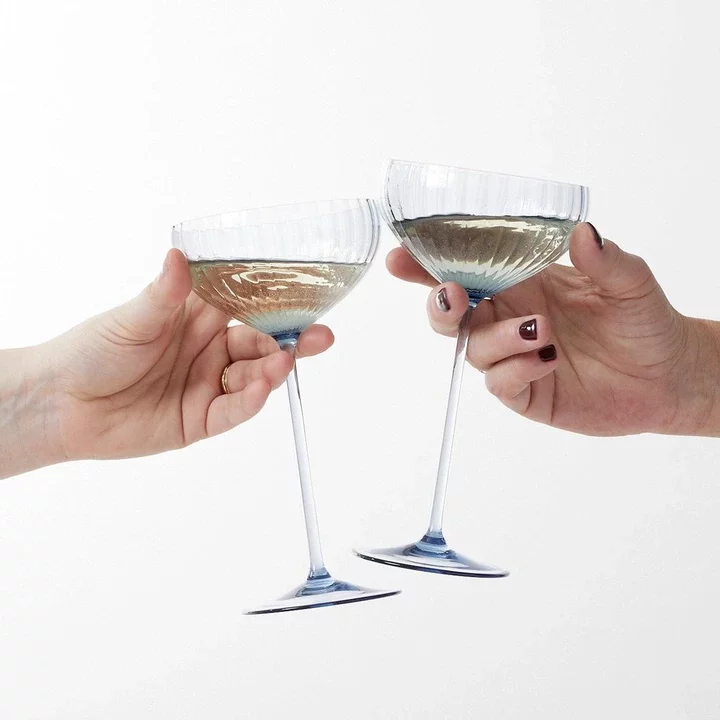 How to Hold a Wine Glass Properly & Why It Matters