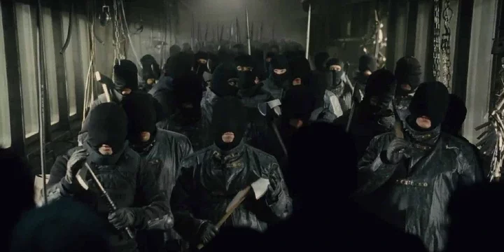 A group of masked individuals in Snowpiercer 2013