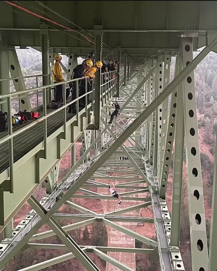 19 year old daredevil gets stuck dangling under California's tallest bridge while attempting social media stunt over 730-foot