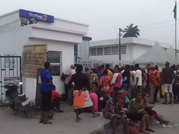 Naira scarcity: Delta residents keep vigil in banks (Photos)