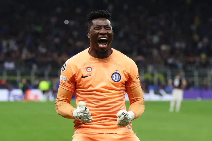 MILAN, ITALY - MAY 16: Andre Onana of FC Internazionale celebrates after Lautaro Martinez of FC Internazionale (not pictured) scores the team's first goal during the UEFA Champions League semi-final second leg match between FC Internazionale and AC Milan at Stadio Giuseppe Meazza on May 16, 2023 in Milan, Italy. (Photo by Alexander Hassenstein/Getty Images)