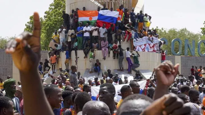 Europeans evacuated from Niger as neighboring West African juntas warn against intervention