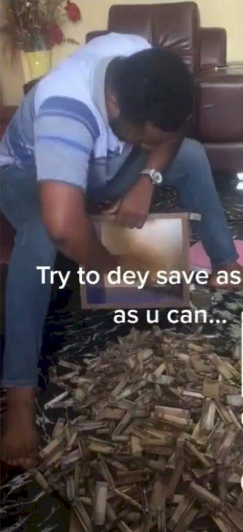 'Try to dey save' - Man says as he shows off amount in his piggy bank (Video)