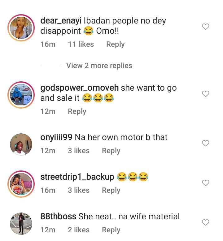 'Na her own motor be that' - Reactions as lady is spotted in Ibadan giving her generator a soap and water bath (Video)