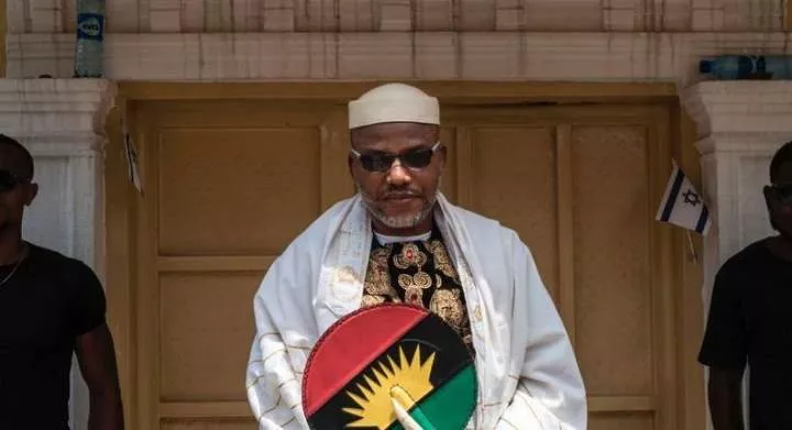 Political activist and leader of the Indigenous People of Biafra (IPOB) movement, Nnamdi Kanu (L), wearing a Jewish prayer shawl, poses in the garden of his house in Umuahia, southeast Nigeria, on May 26, 2017, before commemoration of the 50th anniversary of the war on May 30. (Photo by STEFAN HEUNIS/AFP via Getty Images)