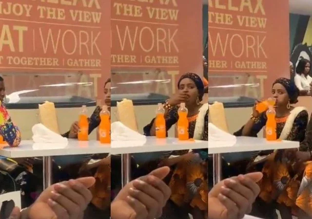 "Life no hard, na you dey find Lekki baddie" - Reactions as couple eats bread with soft drink in a public restaurant.