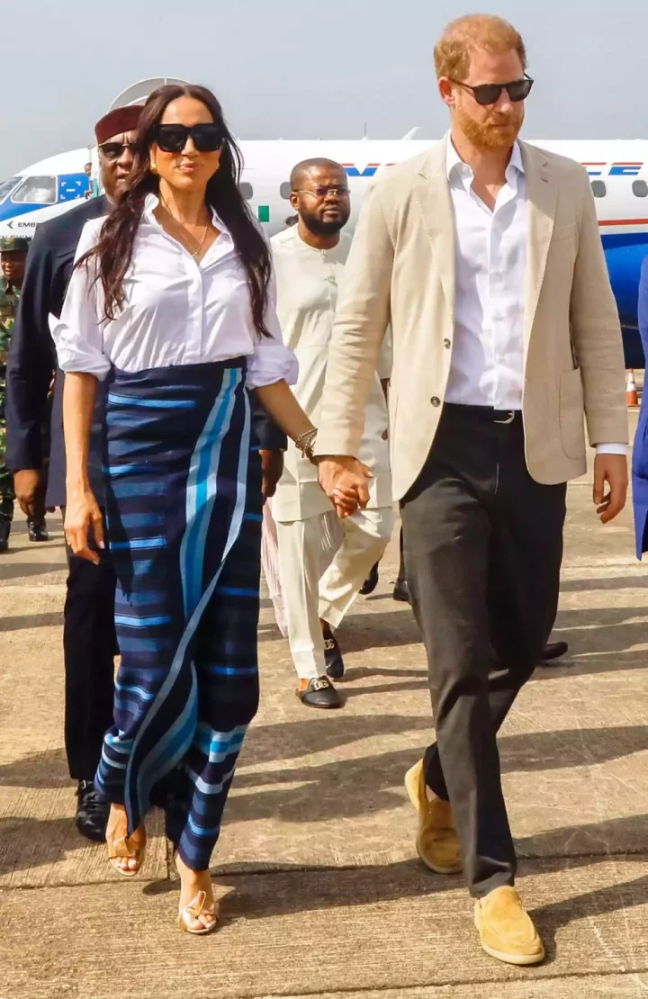 Meghan Markle ties aso oke wrapper as she arrives Lagos with Prince Harry on day 3 of their visit