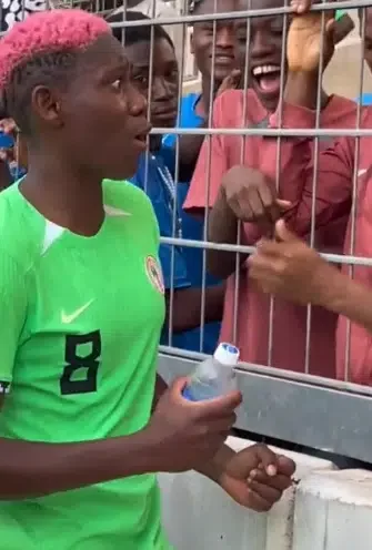 Moment Asisat Oshoala 'opens eyes' for fans trying to grab her jersey in video