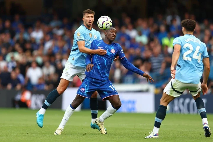 Ruben Dias of Manchester City and Nicolas Jackson of Chelsea during the Premier League match between Chelsea FC and Manchester City FC at Stamford ...