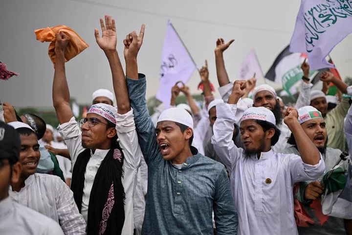 Thousands of activists of Islamist group Hefazat-e-Islam denounce proposed recommendations for equal rights for Muslim women, at a protest rally in Dhaka, Bangladesh, Saturday, May 3, 2025. (AP Photo/Mahmud Hossain Opu)