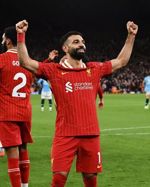 Mohamed Salah celebrates against Man City for Liverpool.