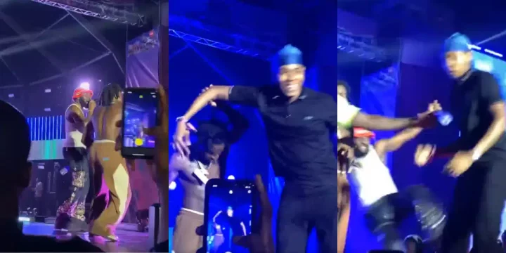 "The guy too rugged" - Moment Odumodublvck tackles fan on stage for grabbing Shallipopi