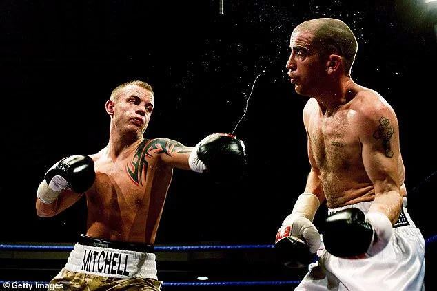 Vinny (left) lands a punch on Johnny Greaves (right) of East Ham during their lightweight contest at York Hall on October 9, 2009