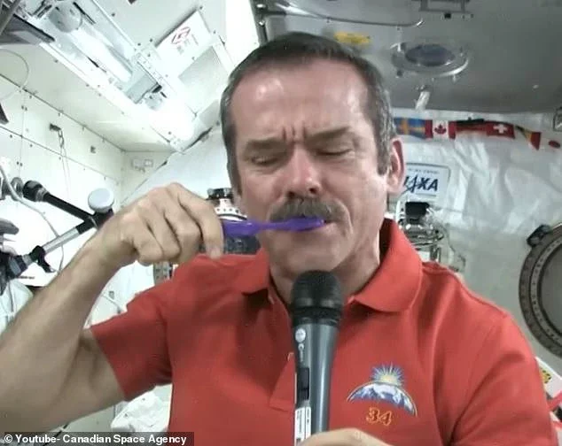 Astronauts brush their teeth in space as you normally would but swallow the toothpaste rather than spitting it out. Pictured: Chris Hadfield shows how to brush your teeth in microgravity