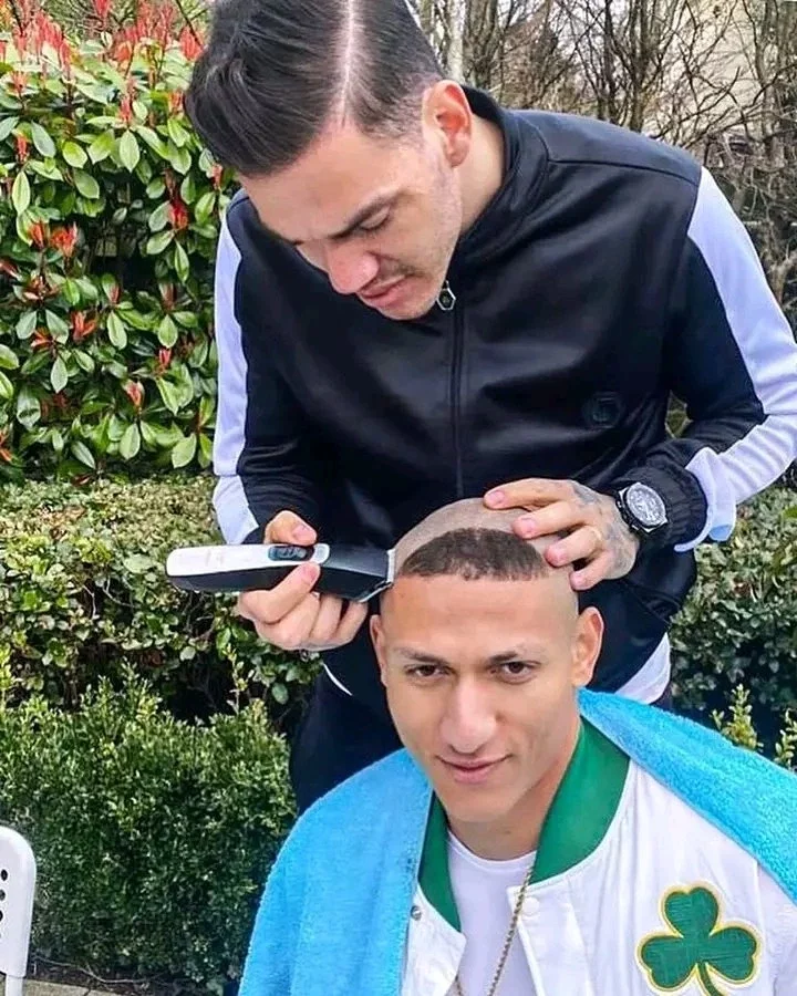 A picture depicting Richarlison and his friend, Ederson shaving his head to get R9 haircut
