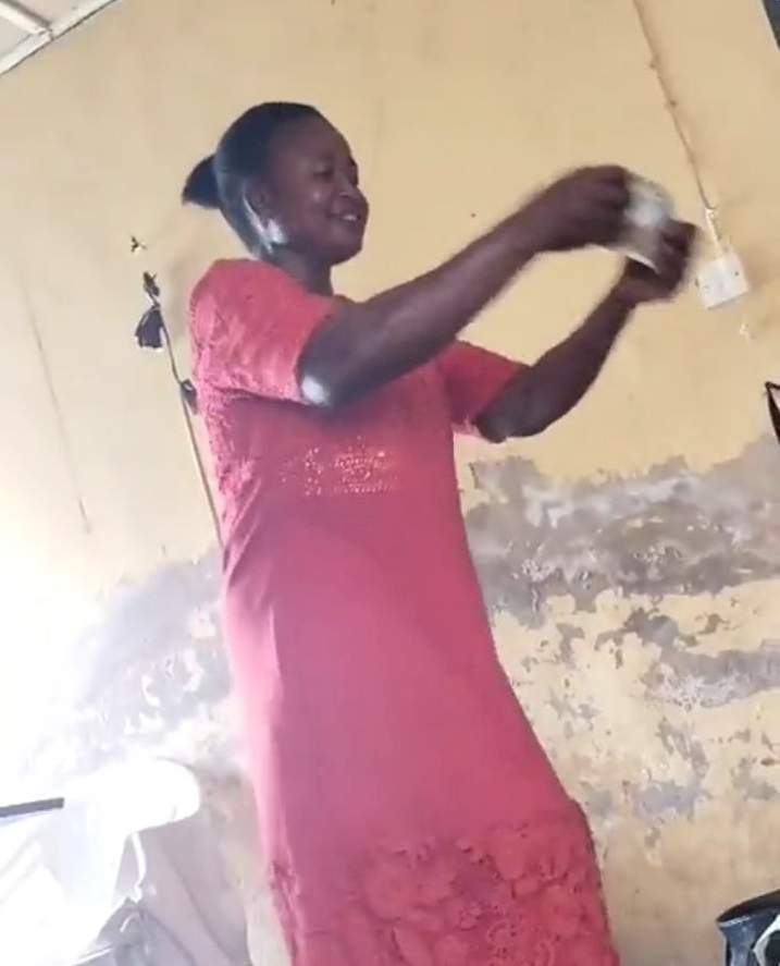 Mother emotional as daughter surprises her with cash and phone gift (Video)