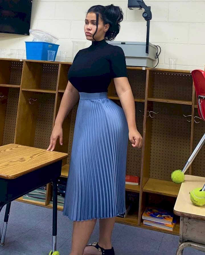 Art teacher under fire for voluptuous curves as parents accuse her of being a distraction (photos)